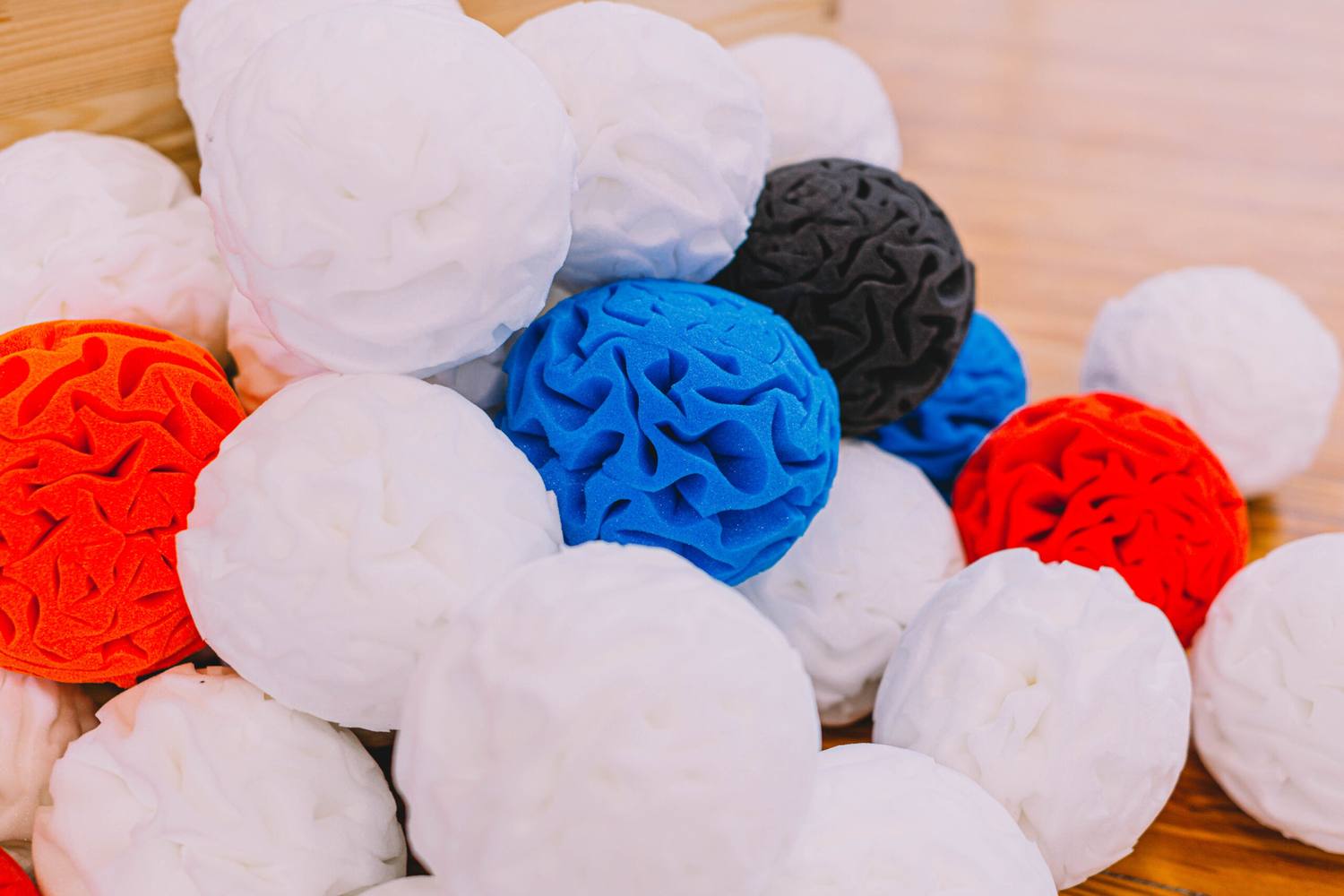 Close-up of the open surface structure of coloured foam snowballs